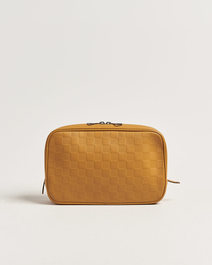 Louis Vuitton Pre-Owned Toiletry Bag Damier Infini Yellow – Geel
