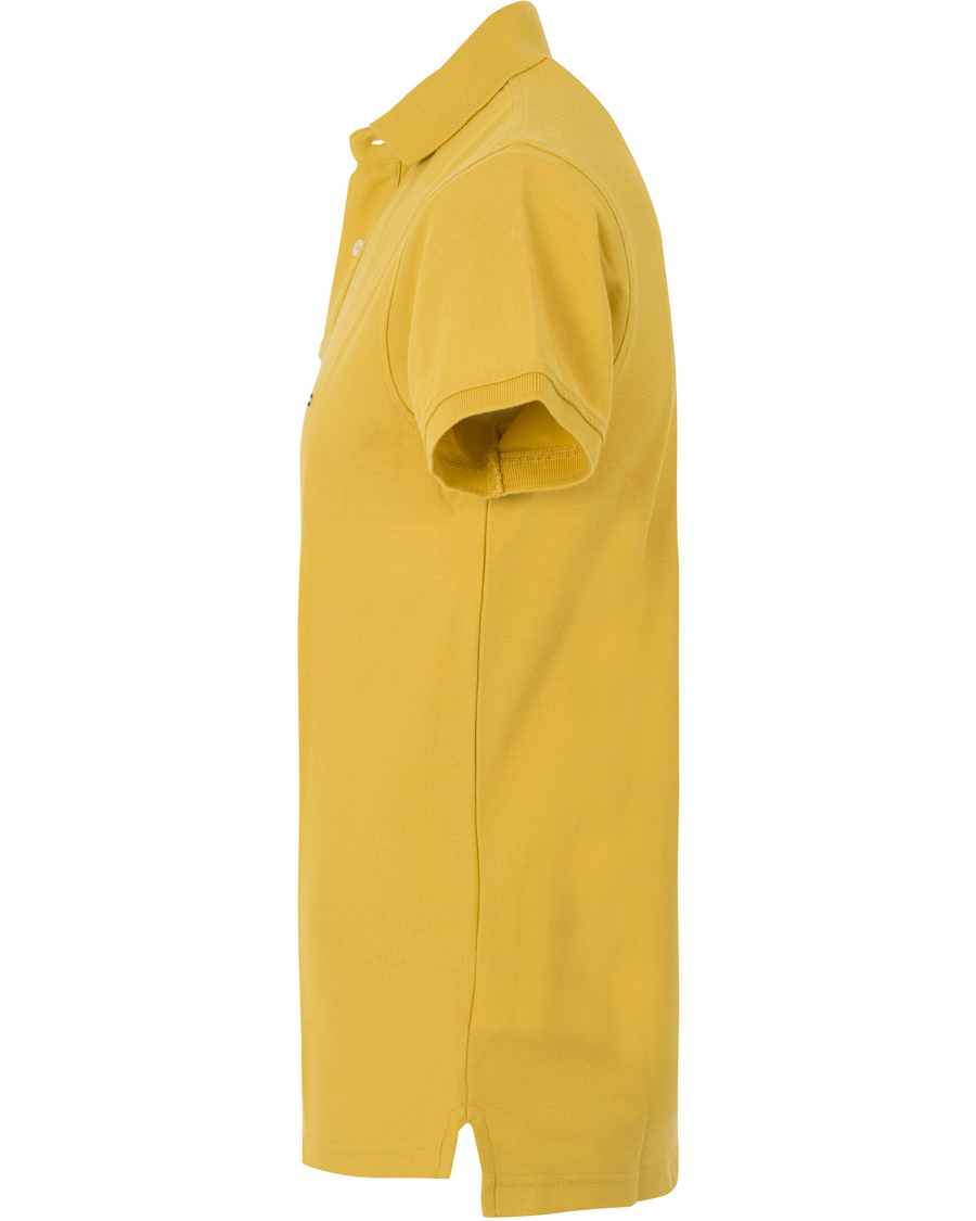 Heren | Polo's | Tommy Hilfiger | Performance Slim Fit Polo Oil Yellow