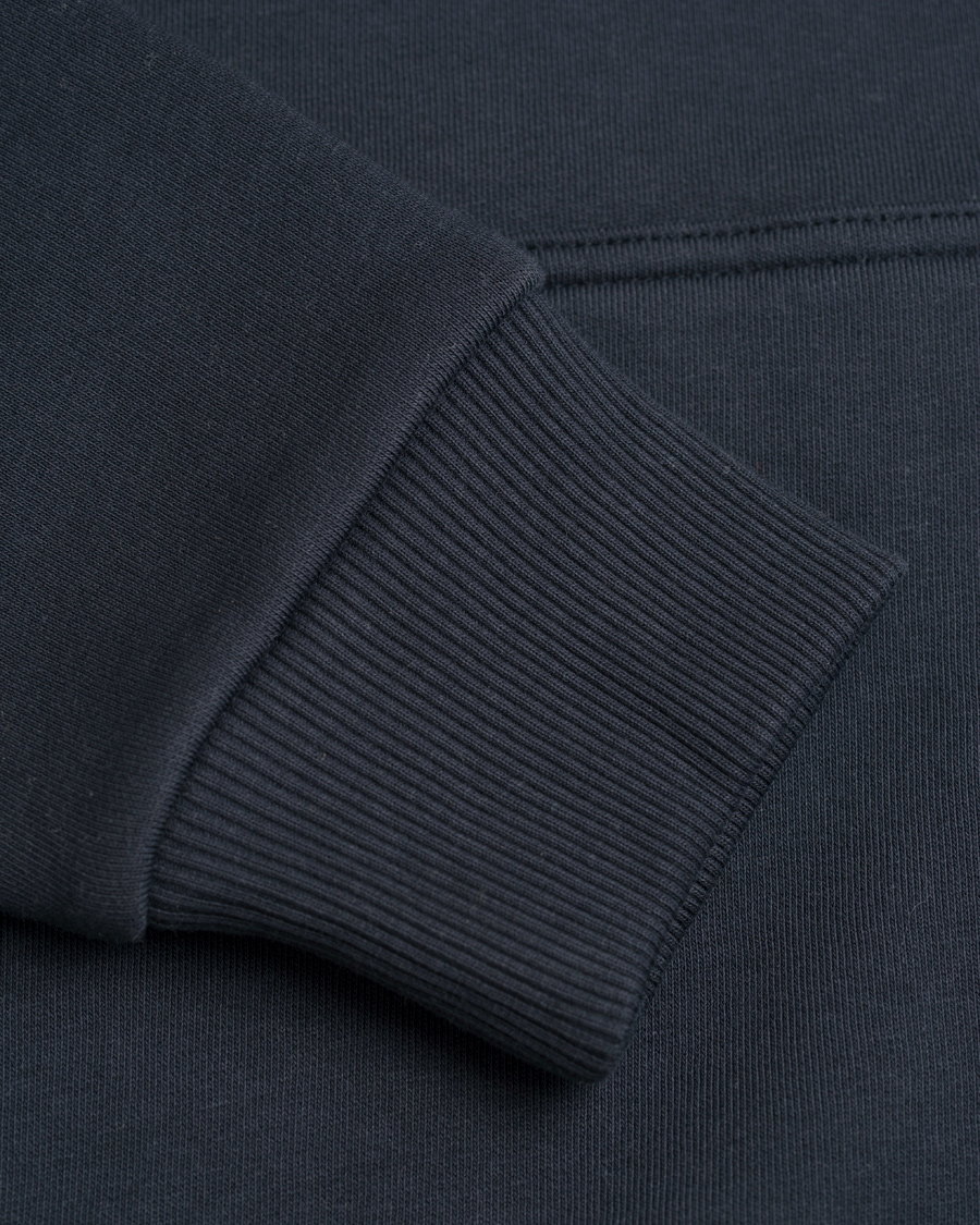 Heren | Truien | Peak Performance | M Logo Hoodie Navy