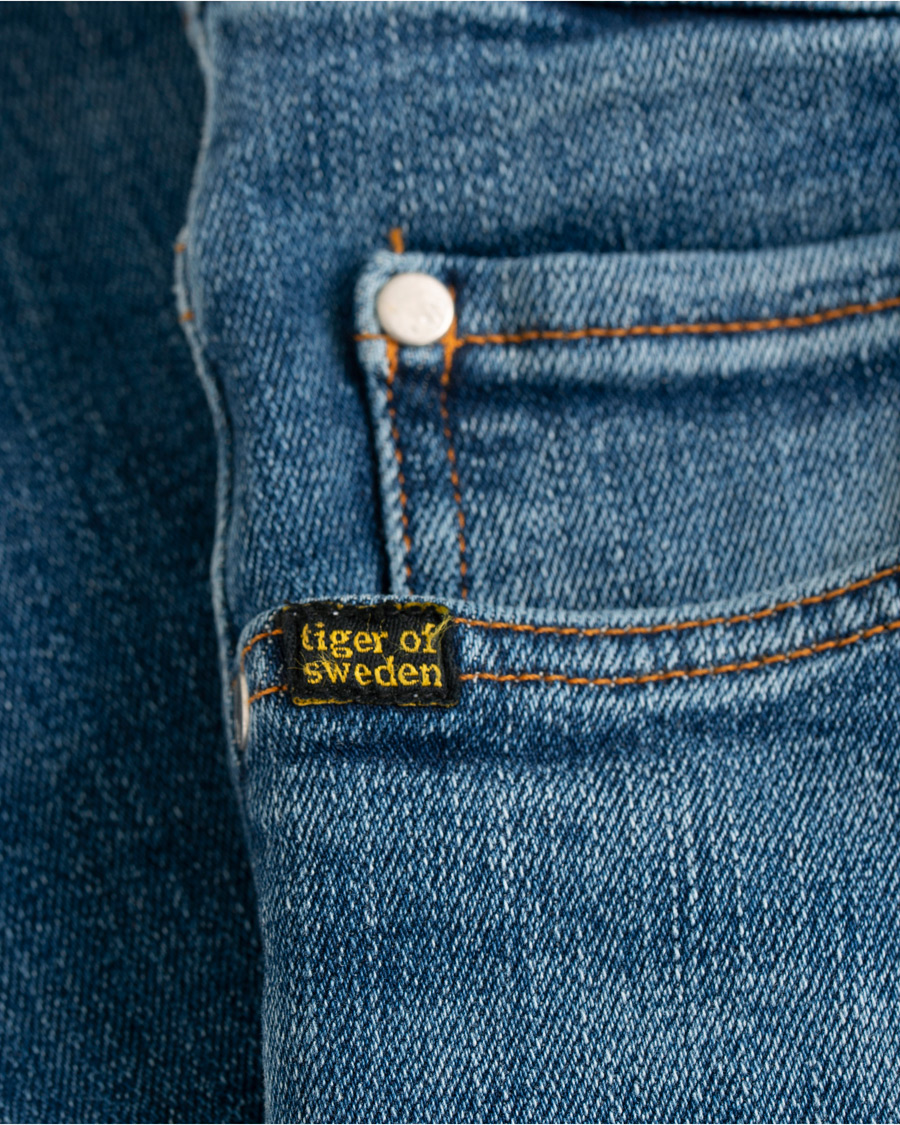 Heren | Jeans | Tiger of Sweden Jeans | Evolve Super Stretch Jeans Medium Blue