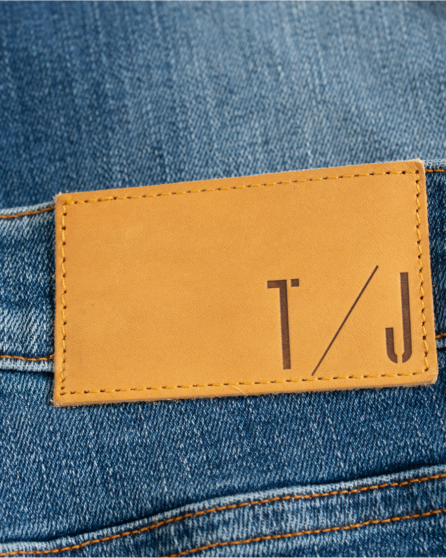 Heren | Jeans | Tiger of Sweden Jeans | Evolve Super Stretch Jeans Medium Blue