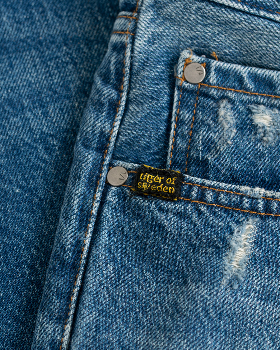 Heren | Jeans | Tiger of Sweden Jeans | Alex Shredded Jeans Medium Blue