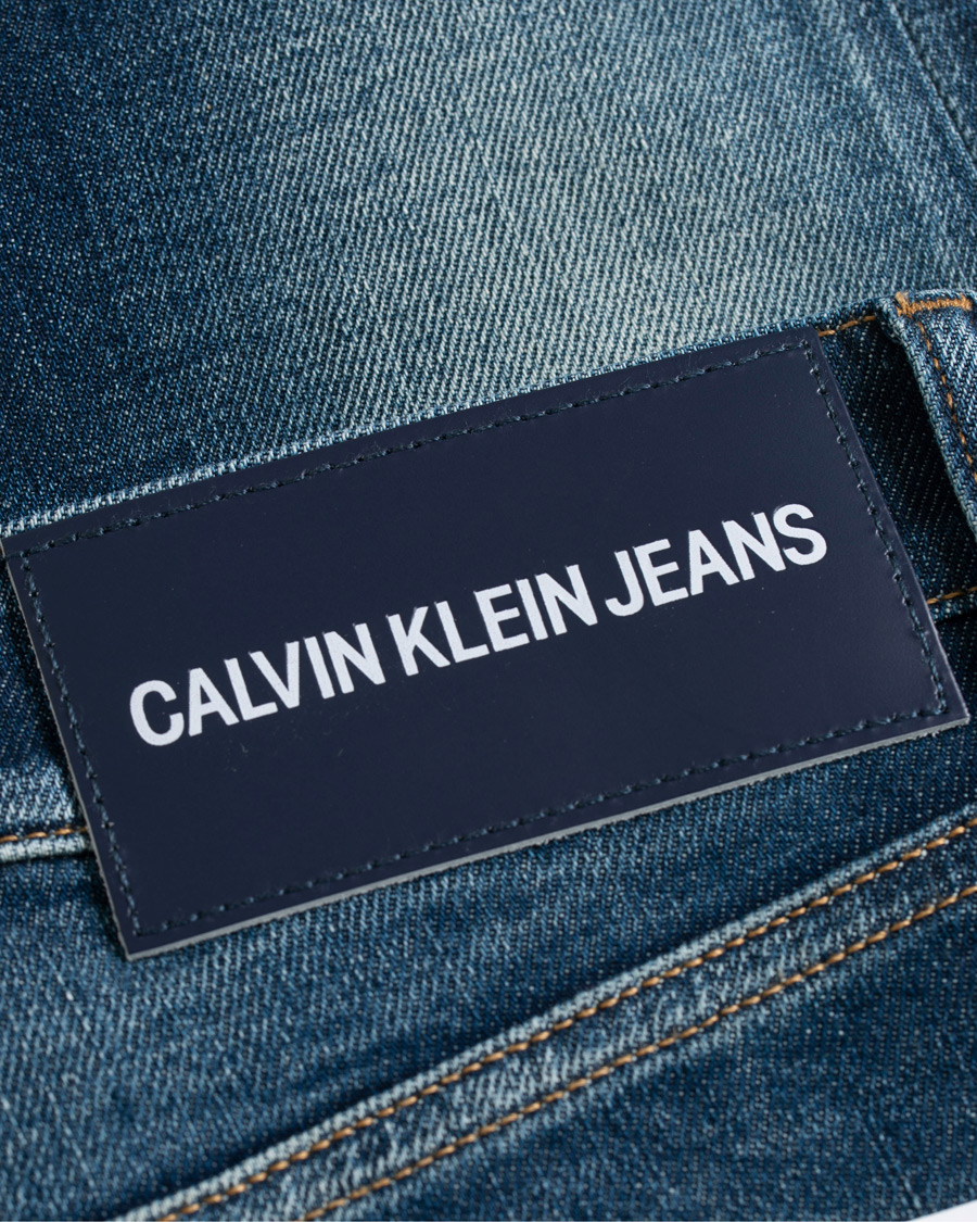 Heren | Jeans | Calvin Klein Jeans | Slim Tapered Shredded Jeans Mid Blue