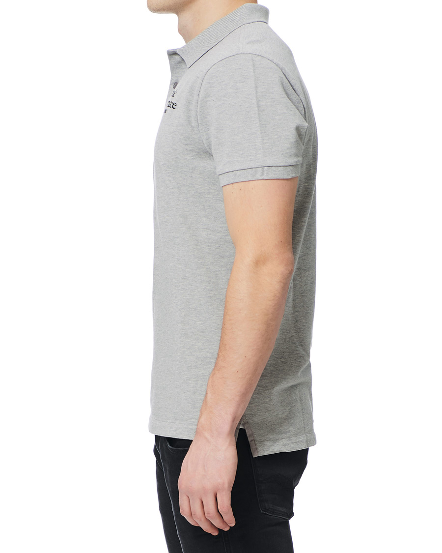 Heren | Polo's | Peak Performance | Original Logo Polo Medium Grey Heather