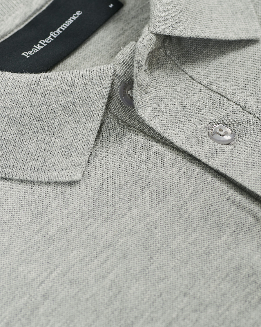 Heren | Polo's | Peak Performance | Original Logo Polo Medium Grey Heather