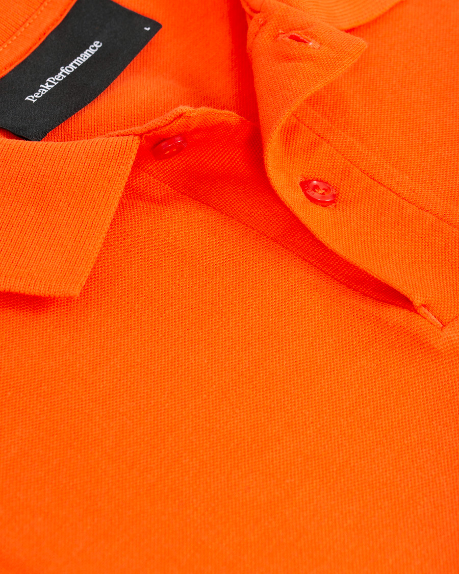 Heren | Polo's | Peak Performance | Original Logo Polo Orange