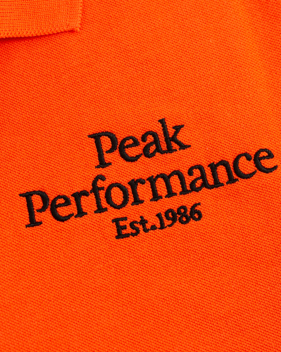 Heren | Polo's | Peak Performance | Original Logo Polo Orange