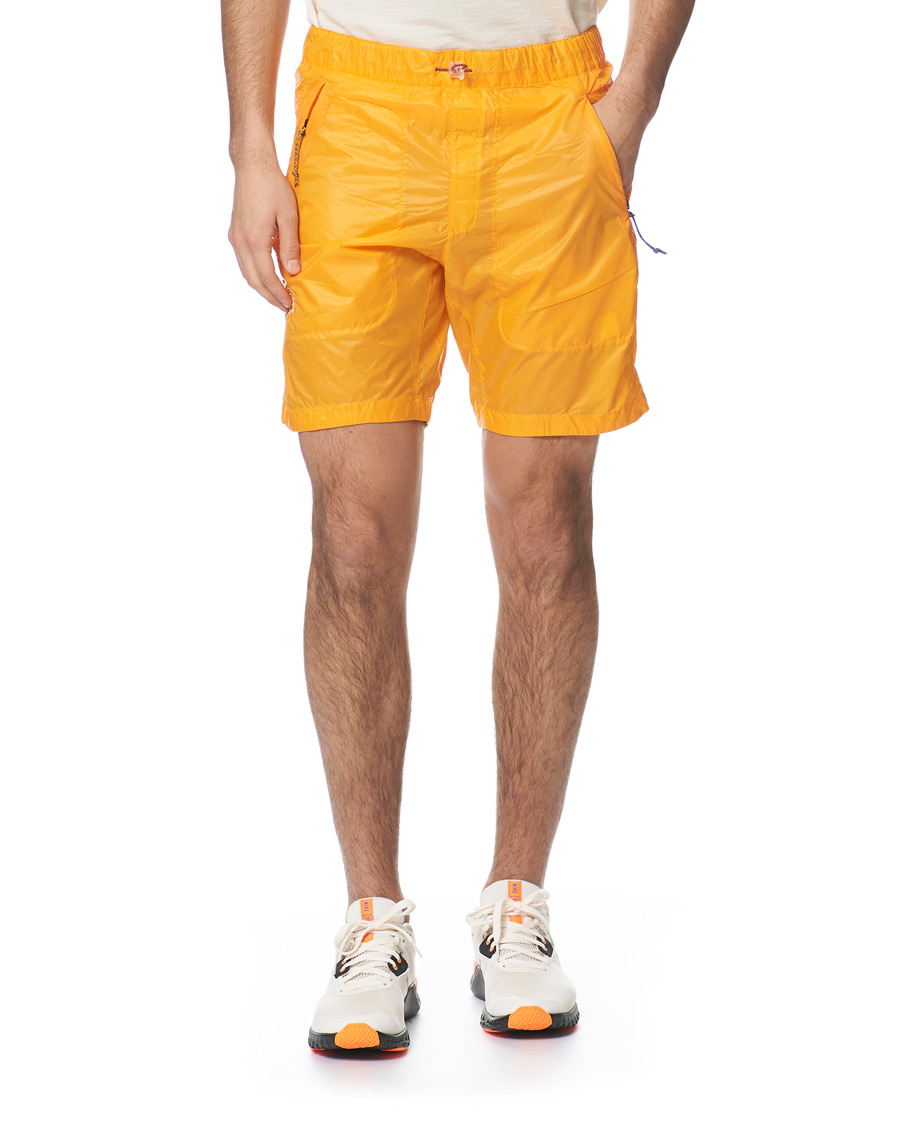 Heren | Korte broek | Peak Performance | Ben Gorham Windbreaker Shorts Orange