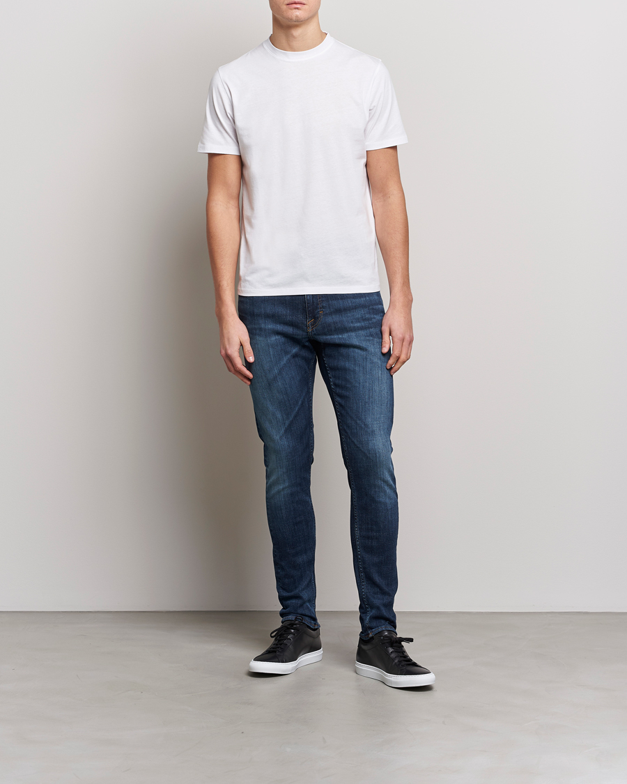 Heren | Jeans | Tiger of Sweden | Evolve Super Stretch Top Jeans Medium Blue