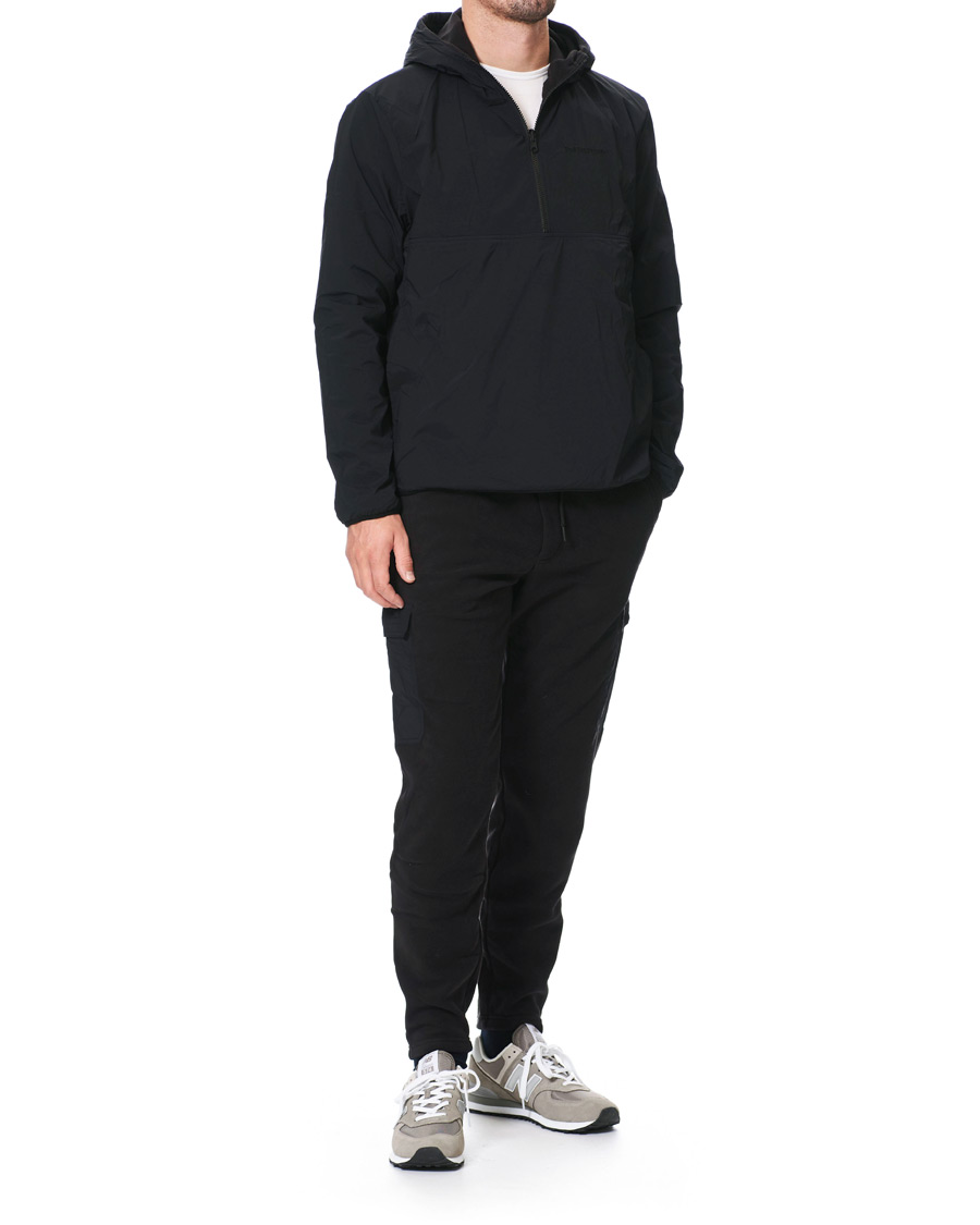 Heren | Truien | Peak Performance | Tech Soft Fleece Reversible Half Zip Hoodie Black
