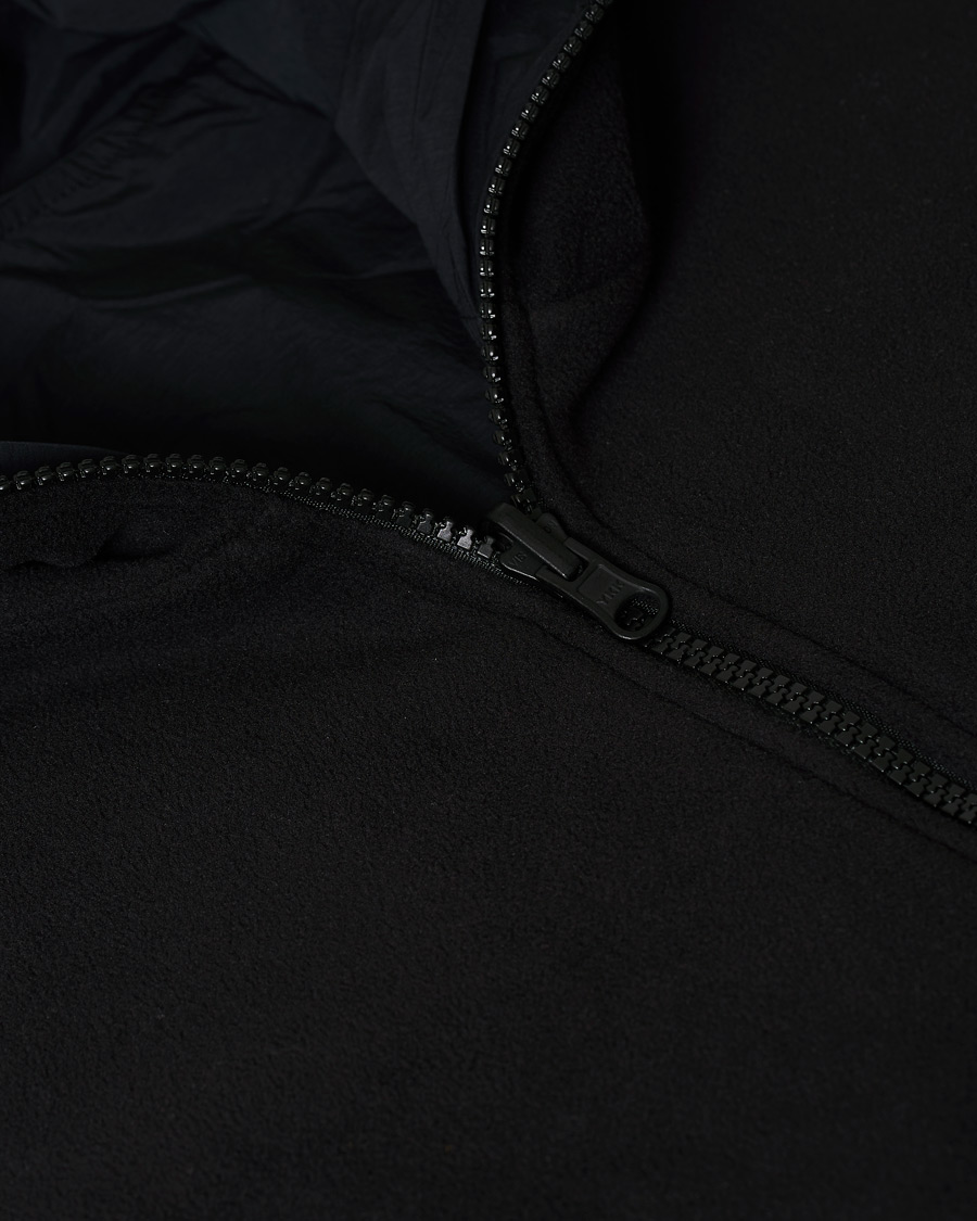 Heren | Truien | Peak Performance | Tech Soft Fleece Reversible Half Zip Hoodie Black
