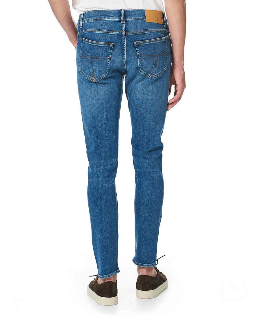 Heren | Jeans | Tiger of Sweden Jeans | Evolve Super Stretch Tide Jeans Light Blue