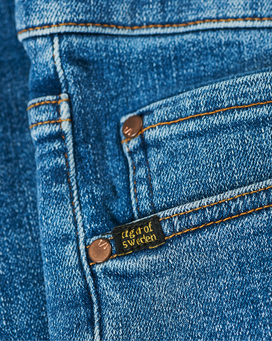 Heren | Jeans | Tiger of Sweden Jeans | Evolve Super Stretch Tide Jeans Light Blue