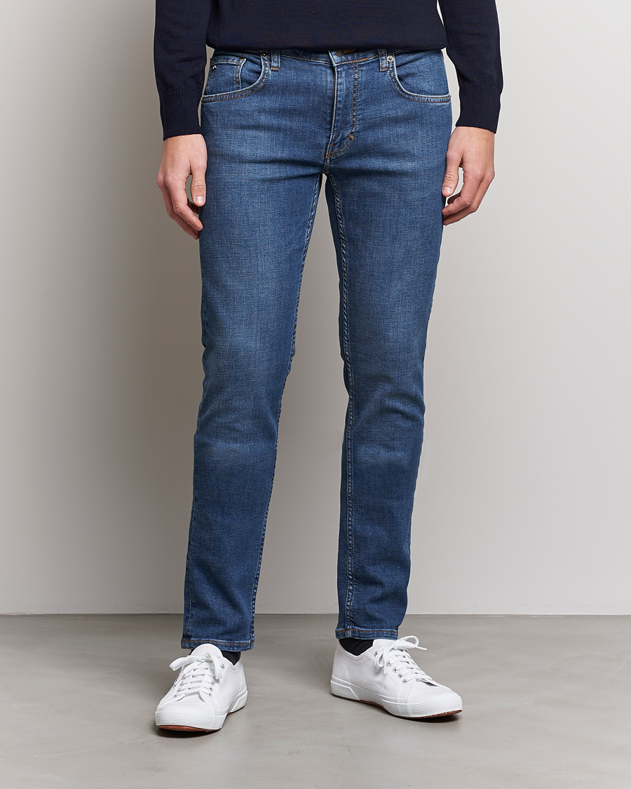 Heren | Business & Beyond | J.Lindeberg | Jay Active Super Stretch Jeans Mid Blue