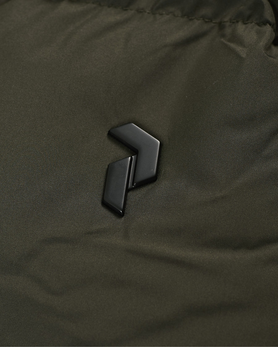 Heren | Jassen | Peak Performance | Rivel Down Hooded Jacket Olive Extreme