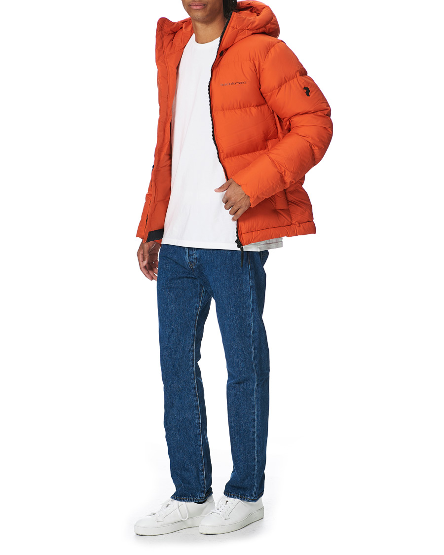 Heren | Jassen | Peak Performance | Rivel Down Hooded Jacket Orange