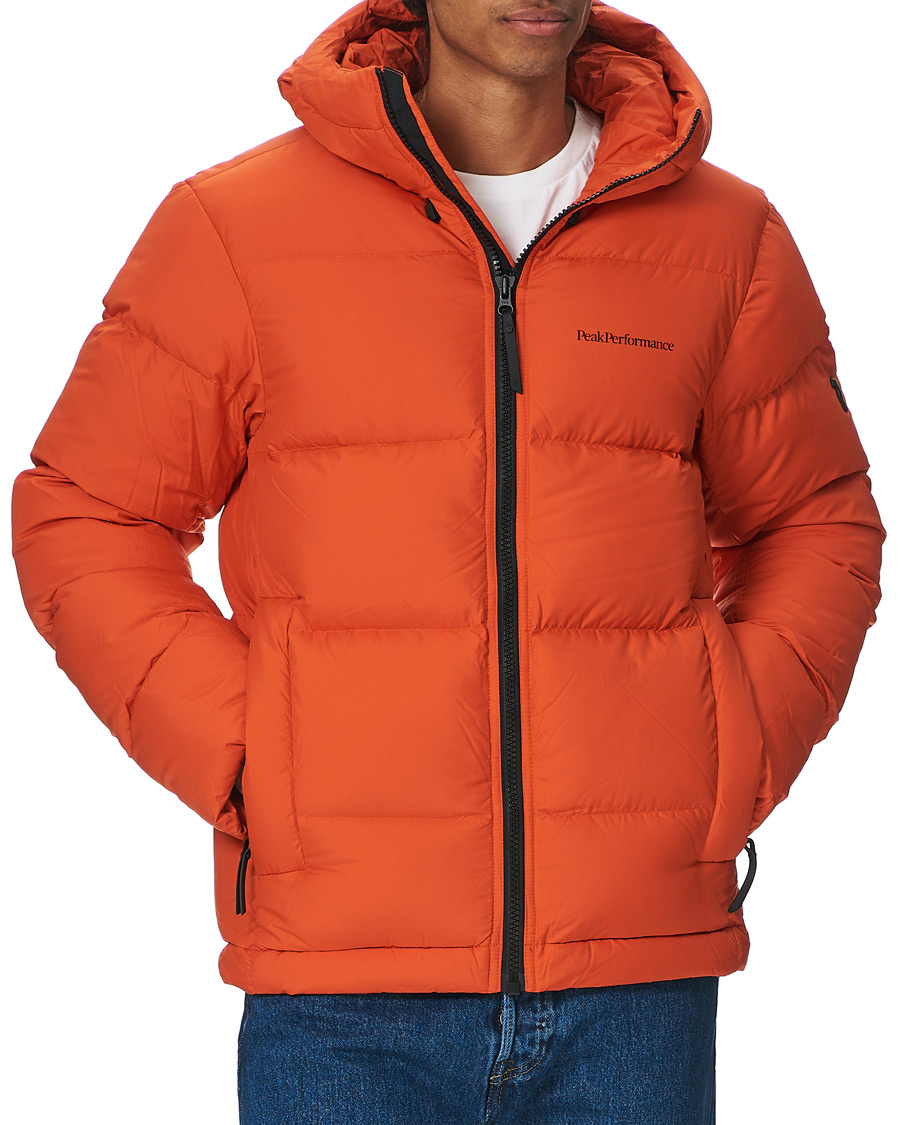 Heren | Jassen | Peak Performance | Rivel Down Hooded Jacket Orange
