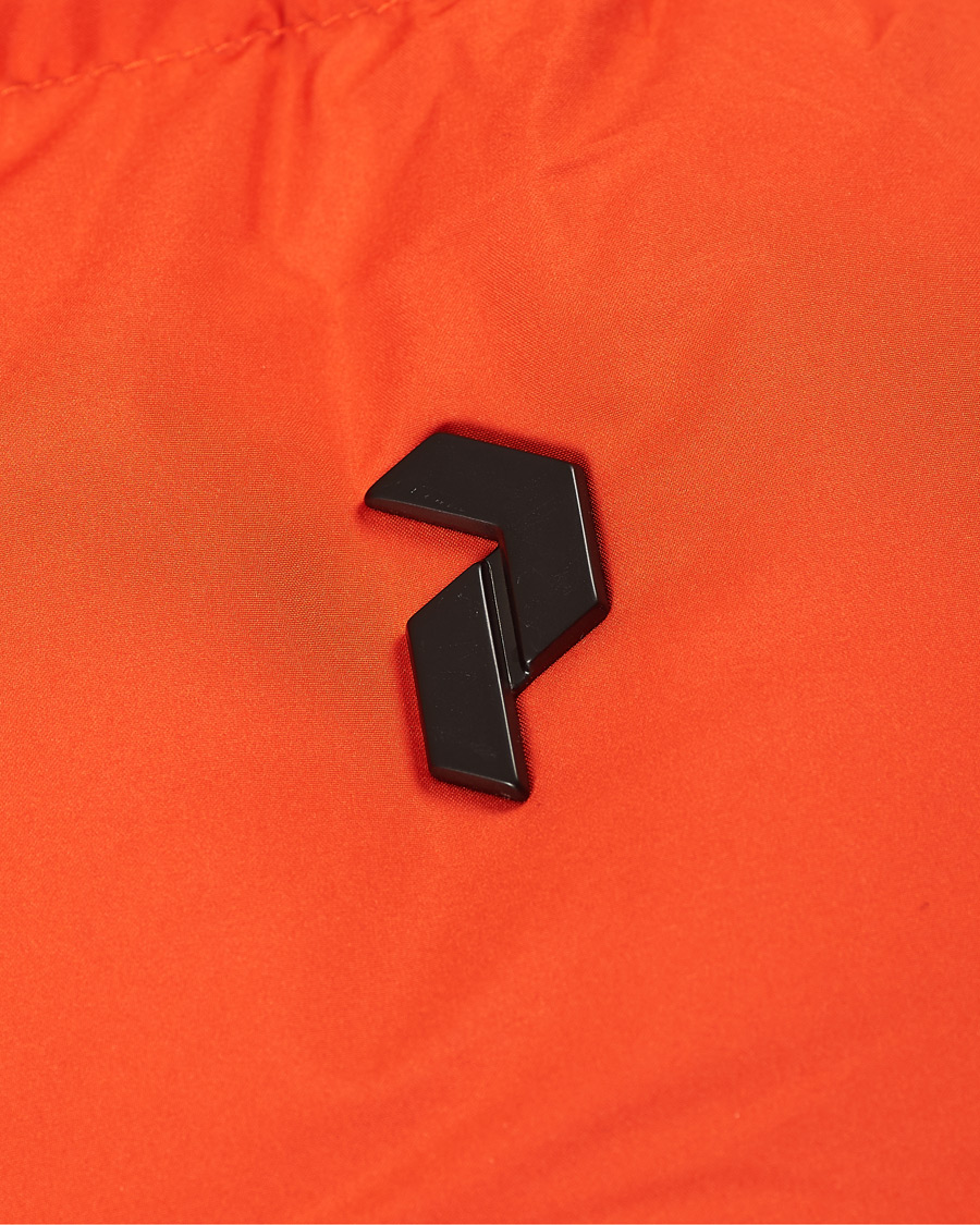 Heren | Jassen | Peak Performance | Rivel Down Hooded Jacket Orange