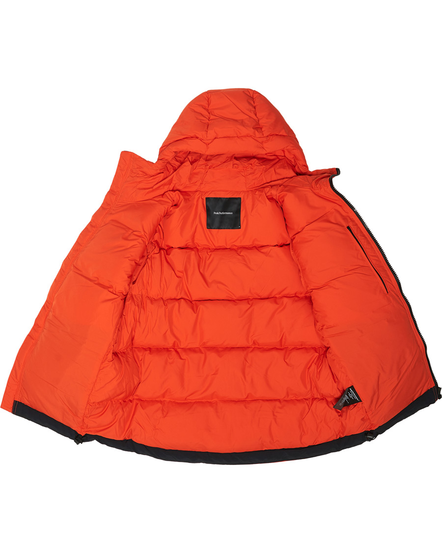 Heren | Jassen | Peak Performance | Rivel Down Hooded Jacket Orange