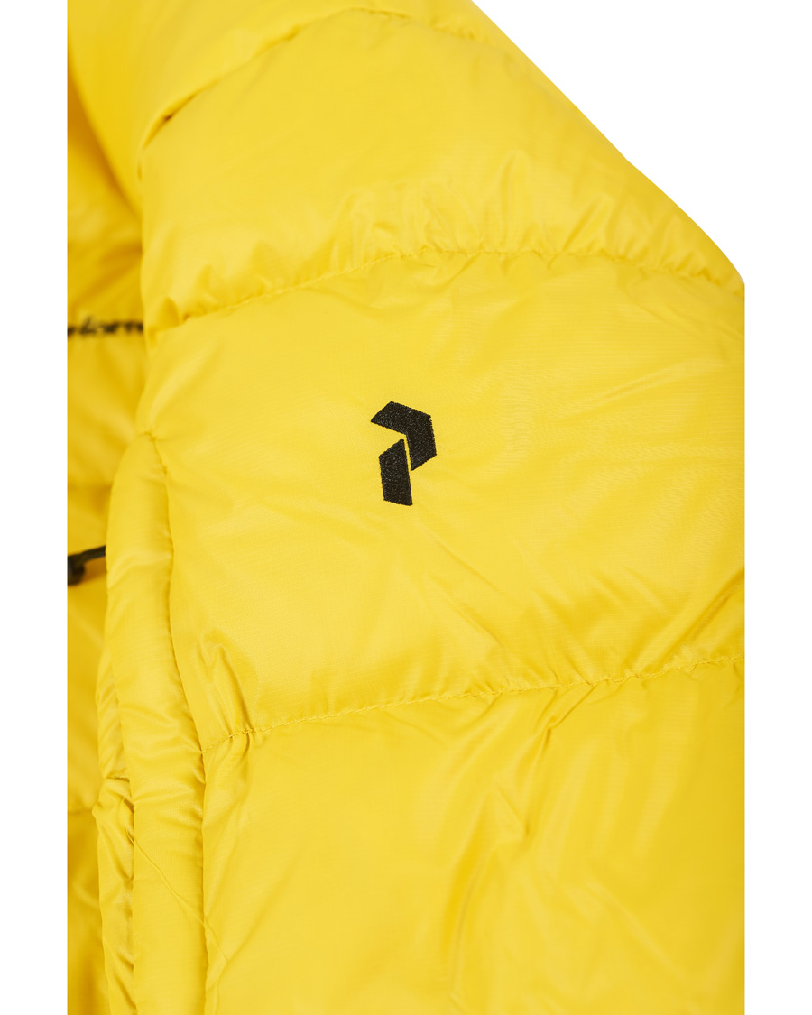 Heren | Jassen | Peak Performance | Frost Down Hooded Jacket Trek Yellow