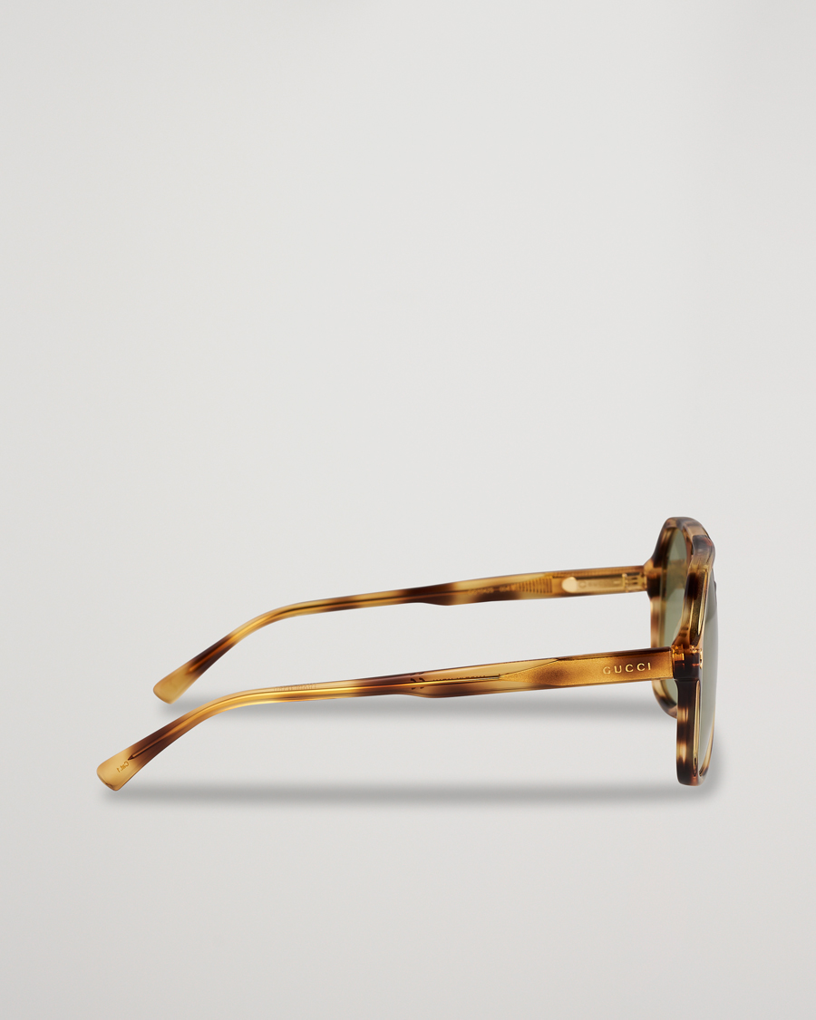 Heren | Gucci GG1042S Sunglasses Havana Green | Gucci | GG1042S Sunglasses Havana Green