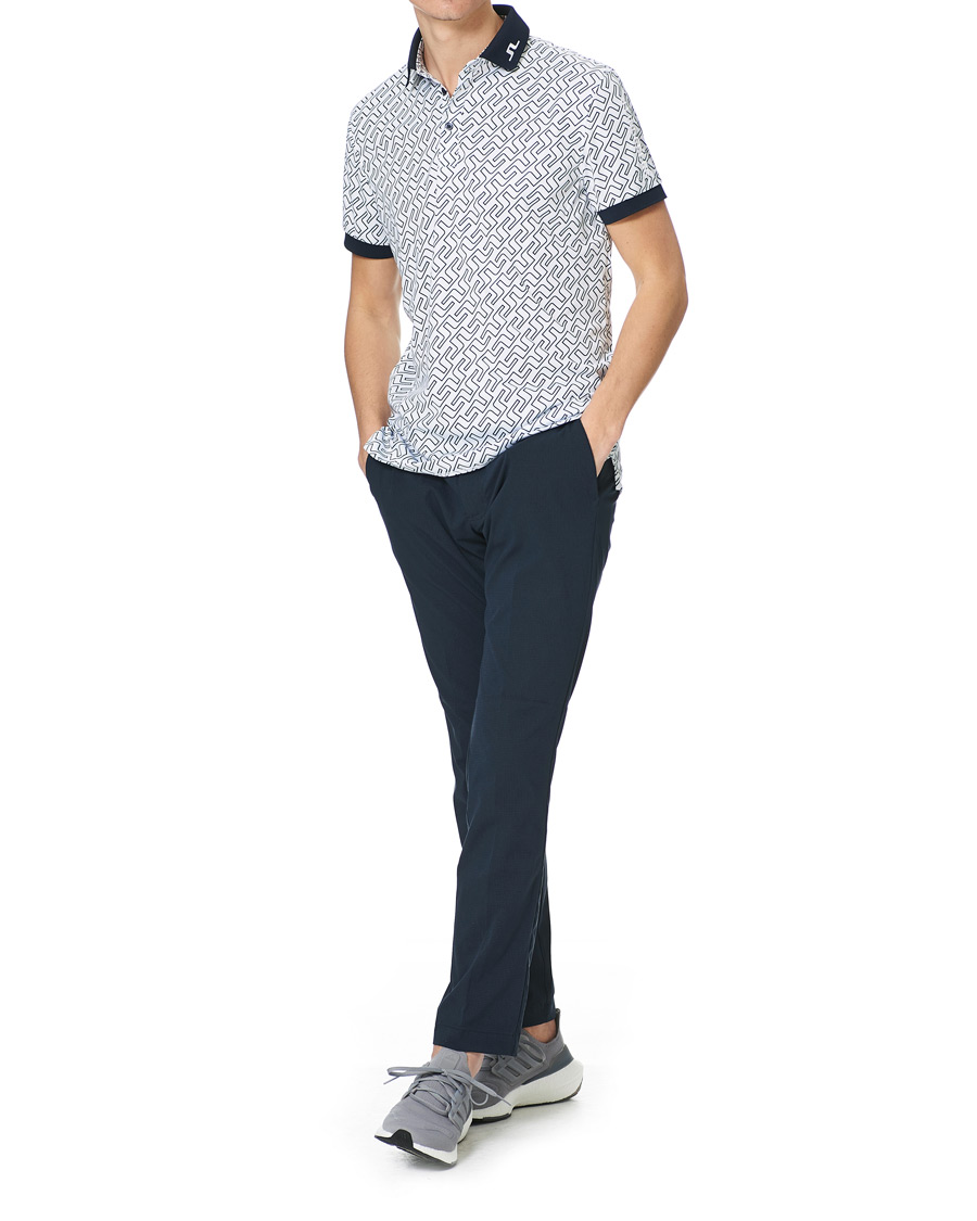 Heren | Polo's | J.Lindeberg | Tour Tech Reg Fit Print Polo JL Navy Bridge Monogram