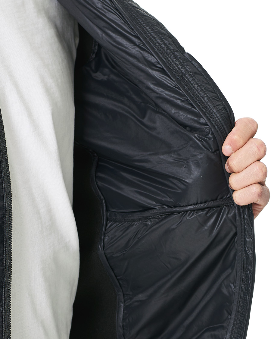 Heren | Jassen | Peak Performance | Helium Hybrid Black