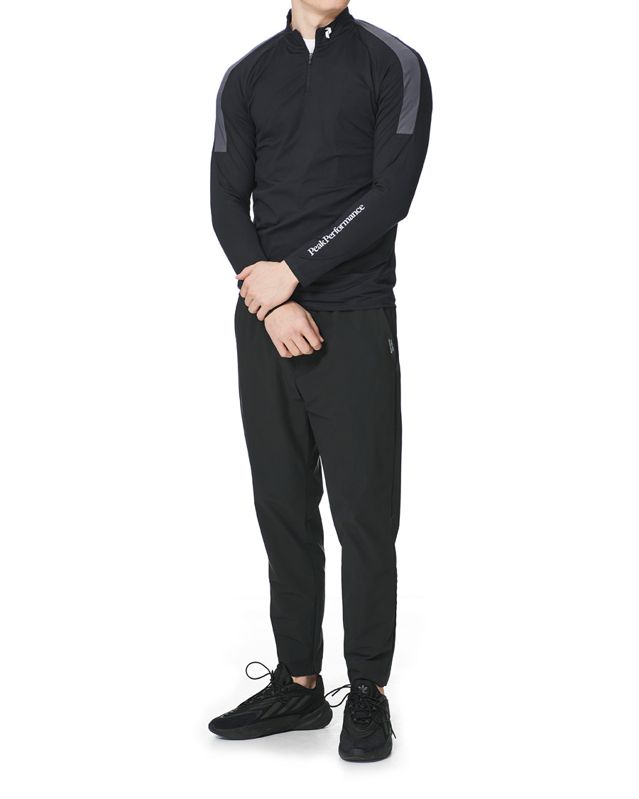 Heren | T-shirts | Peak Performance | Chase Half Zip Long Sleeve Tee Black