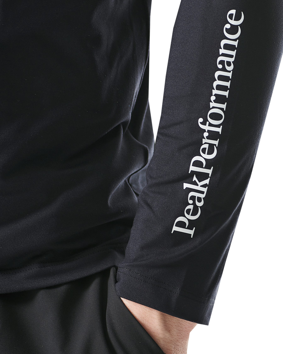 Heren | T-shirts | Peak Performance | Chase Half Zip Long Sleeve Tee Black