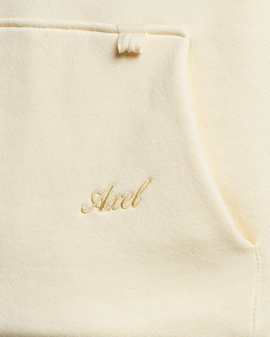 Heren | Truien | Axel Arigato | Title Hoodie Pale Yellow