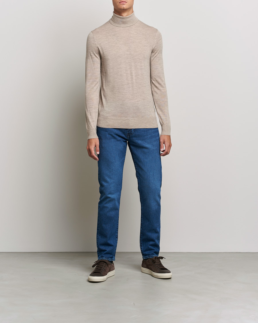 Heren | Truien | Tiger of Sweden | Neville Extra Fine Merino Polo Beige Melange