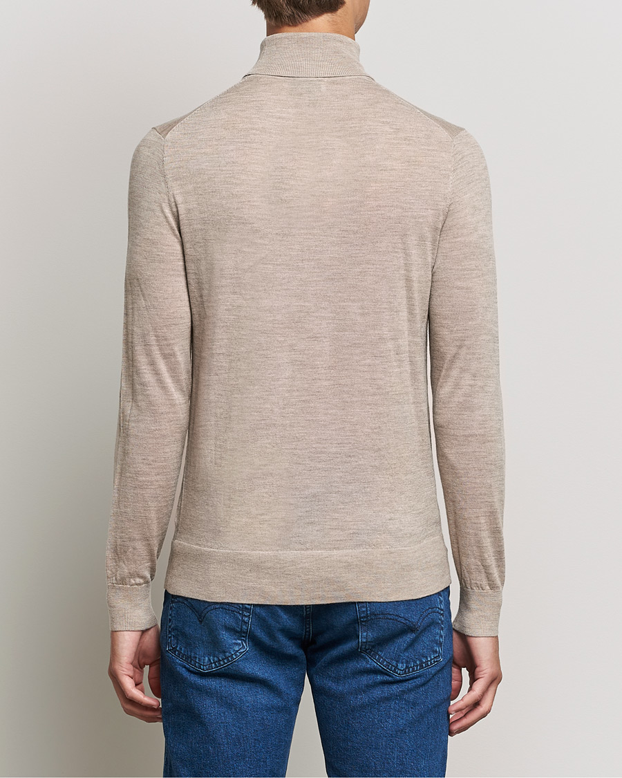 Heren | Truien | Tiger of Sweden | Neville Extra Fine Merino Polo Beige Melange