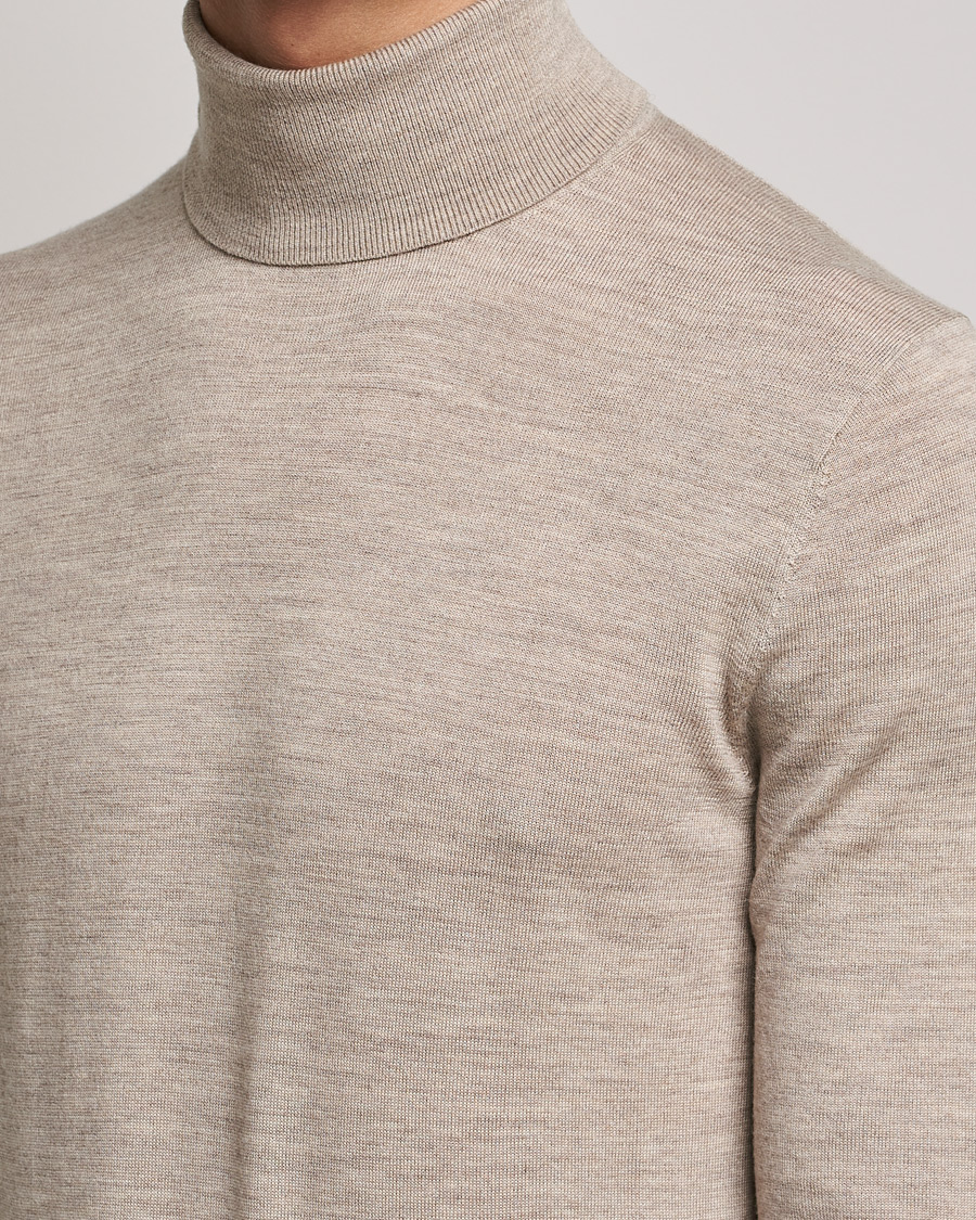 Heren | Truien | Tiger of Sweden | Neville Extra Fine Merino Polo Beige Melange