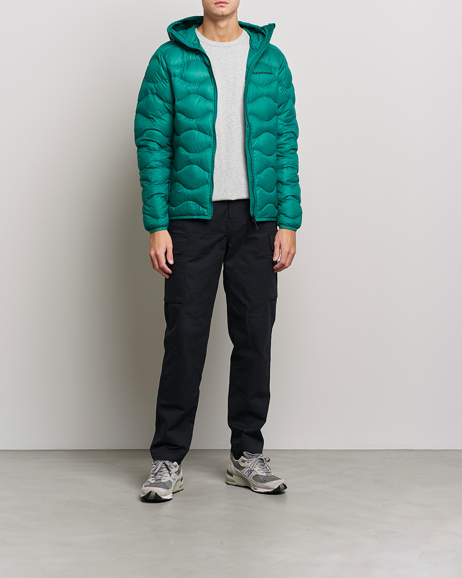 Heren | Jassen | Peak Performance | Helium Down Hood Green Ivy