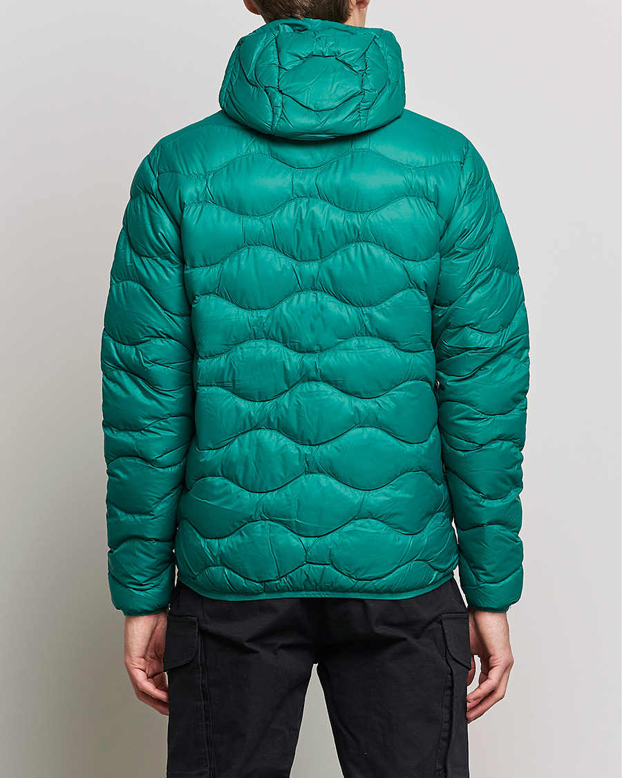 Heren | Jassen | Peak Performance | Helium Down Hood Green Ivy