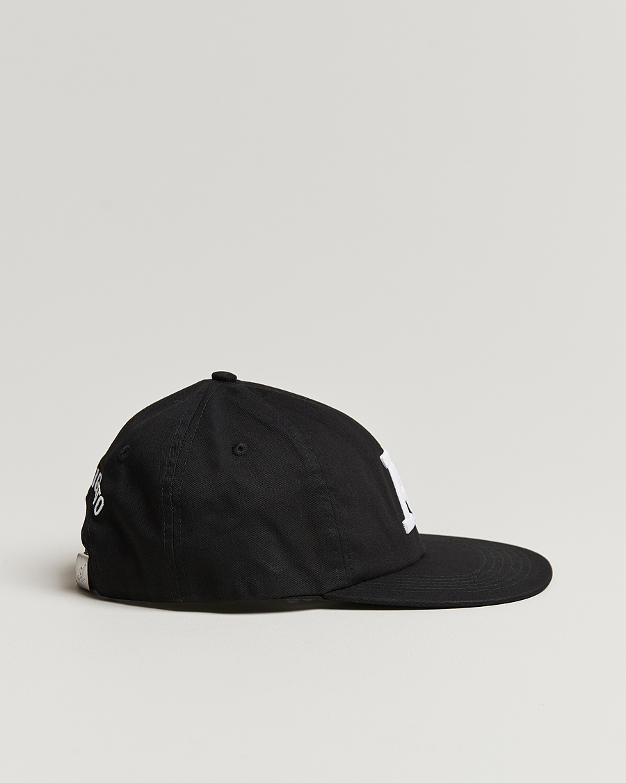 Heren | Axel Arigato Varsity A Flat Cap Black | Axel Arigato | Varsity A Flat Cap Black