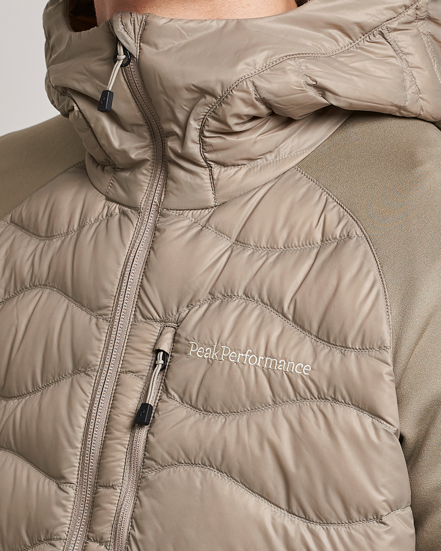 Heren | Jassen | Peak Performance | Helium Hooded Hybrid Avid Beige
