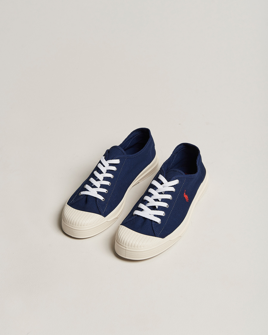 Heren | Polo Ralph Lauren Paloma Canvas Sneaker Newport Navy/Red | Polo Ralph Lauren | Paloma Canvas Sneaker Newport Navy/Red