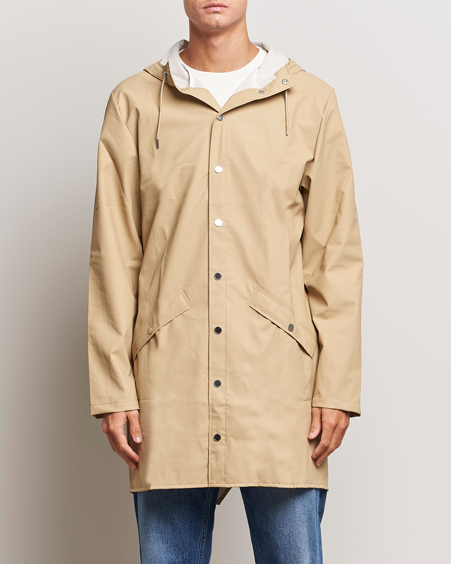 Heren | Trotseer de regen in stijl | RAINS | Long Jacket Sand