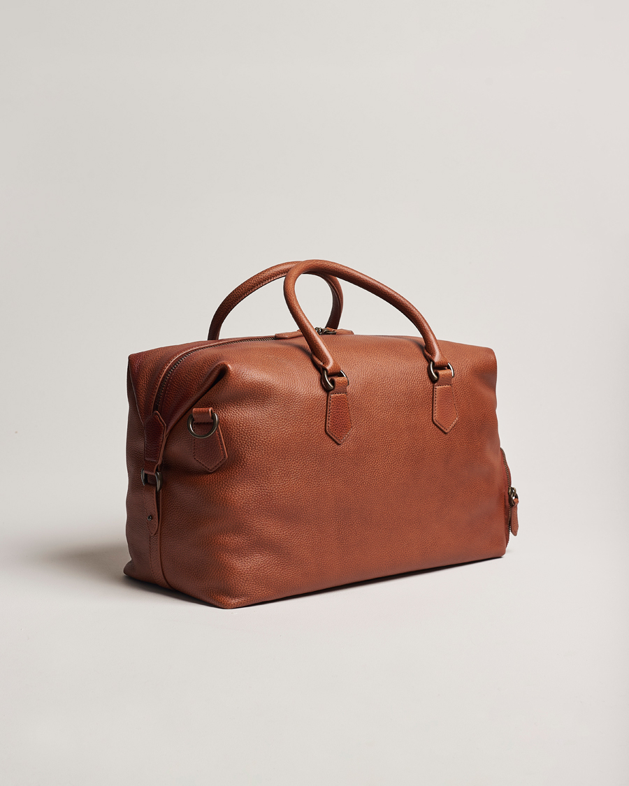 Heren | Polo Ralph Lauren Pebble Leather Duffle Bag Saddle Brown | Polo Ralph Lauren | Pebble Leather Duffle Bag Saddle Brown