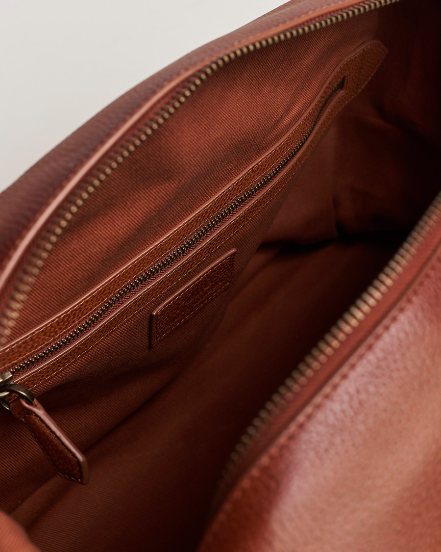 Heren | Polo Ralph Lauren Pebble Leather Duffle Bag Saddle Brown | Polo Ralph Lauren | Pebble Leather Duffle Bag Saddle Brown