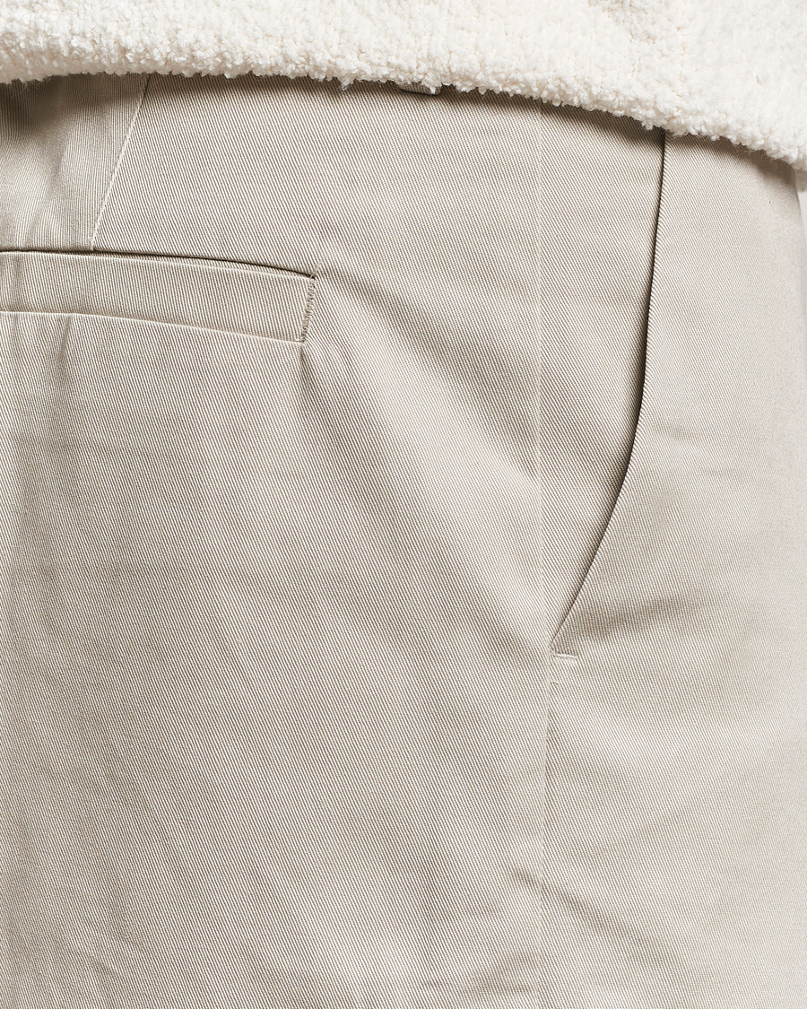 Heren | Broeken | Axel Arigato | Serif Relaxed Fit Trousers Pale Beige