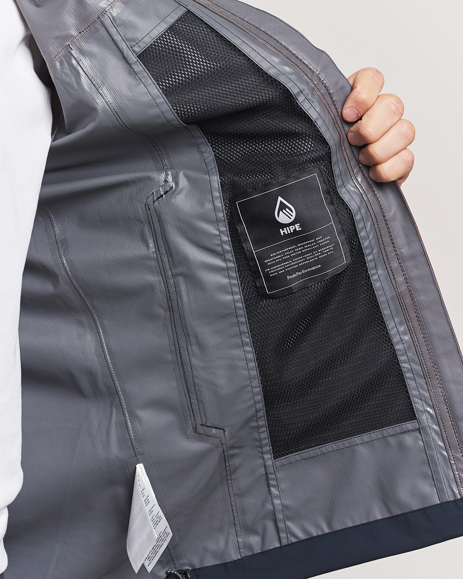 Heren | Jassen | Peak Performance | Trail Hipe Hooded Jacket Spiced/Salute Navy/Desert