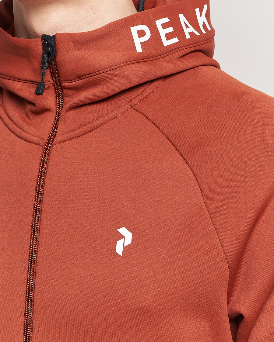 Heren | Truien | Peak Performance | Rider Hooded Full Zip Spiced