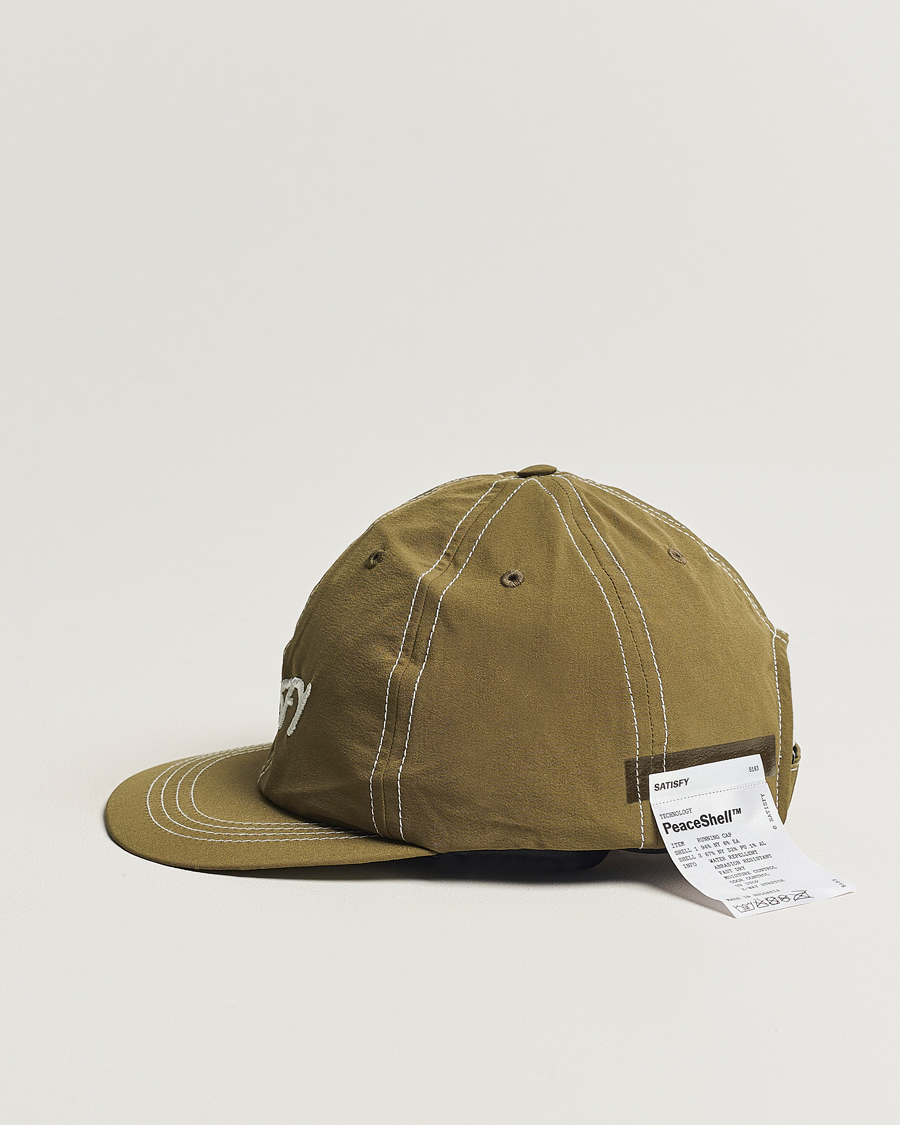 Heren | Satisfy PeaceShell Running Cap Oil Green | Satisfy | PeaceShell Running Cap Oil Green