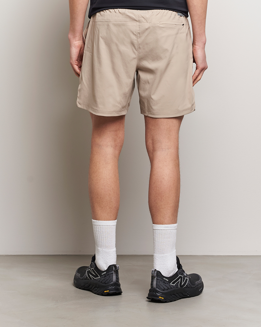 Heren | Korte broek | New Balance Running | Seamless Shorts 7 Lined Stoneware
