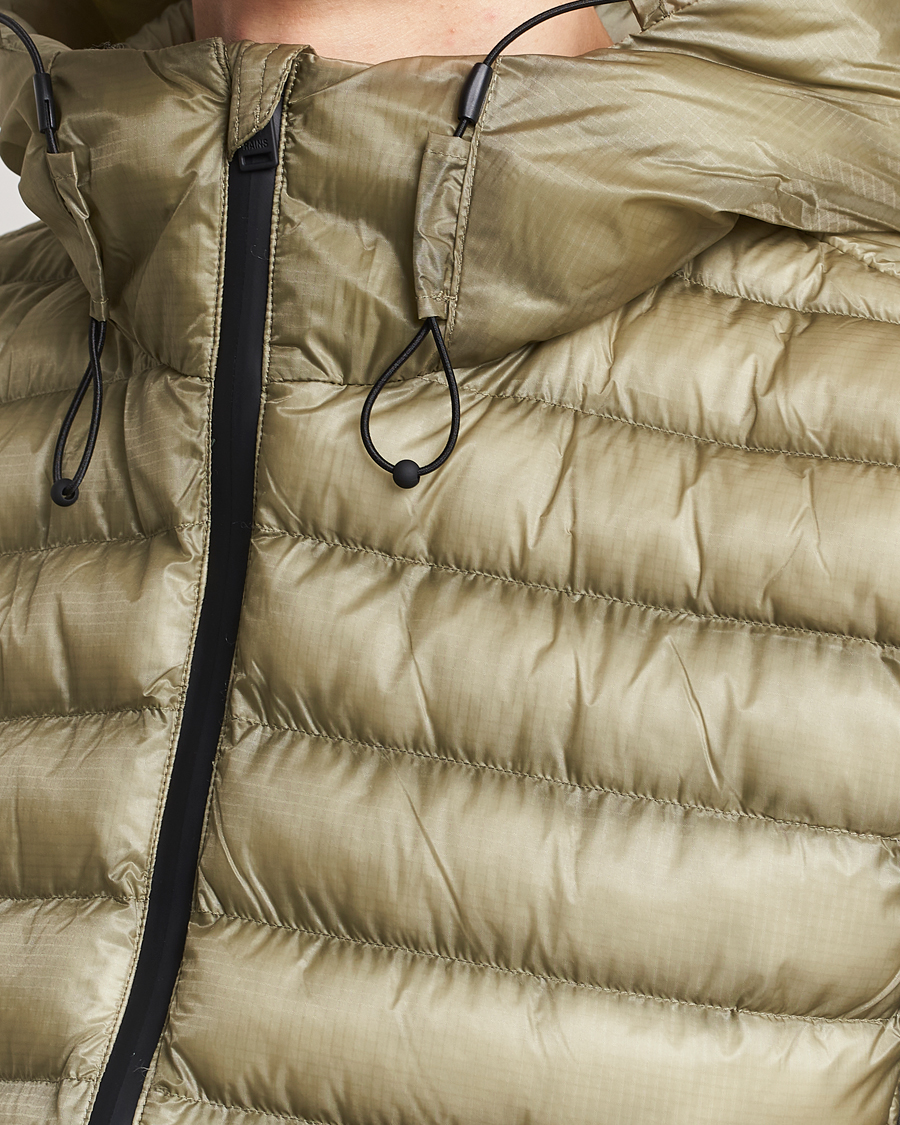 Heren | Jassen | RAINS | Kaunas Hybrid Hooded Vest Earth