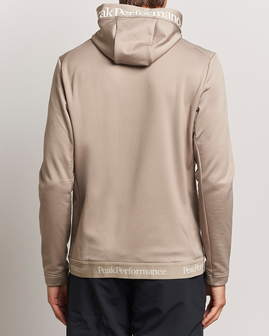 Heren | Truien | Peak Performance | Rider Tech Zip Hood Avid Beige