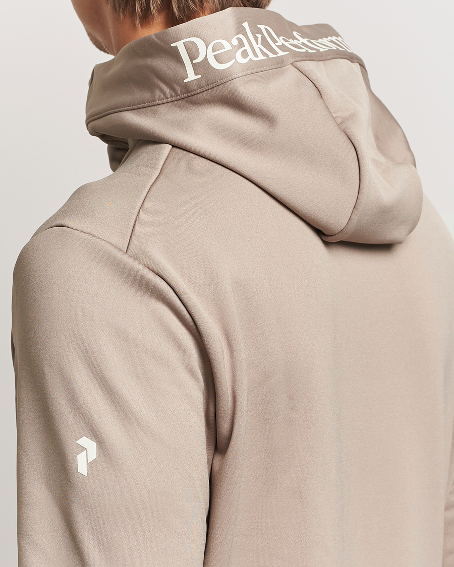 Heren | Truien | Peak Performance | Rider Tech Zip Hood Avid Beige