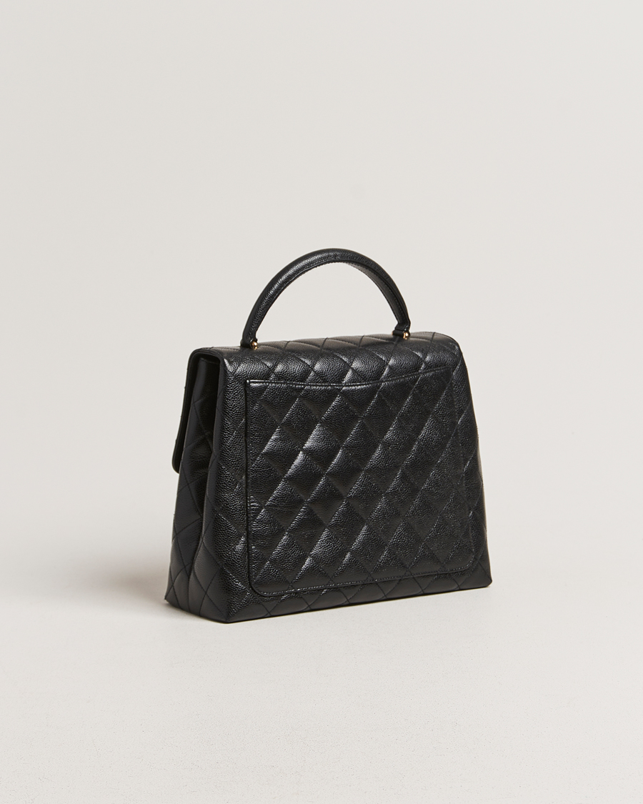 Heren | Gifts for Her | Chanel Pre-Owned | Kelly Top Handle Bag Black Caviar